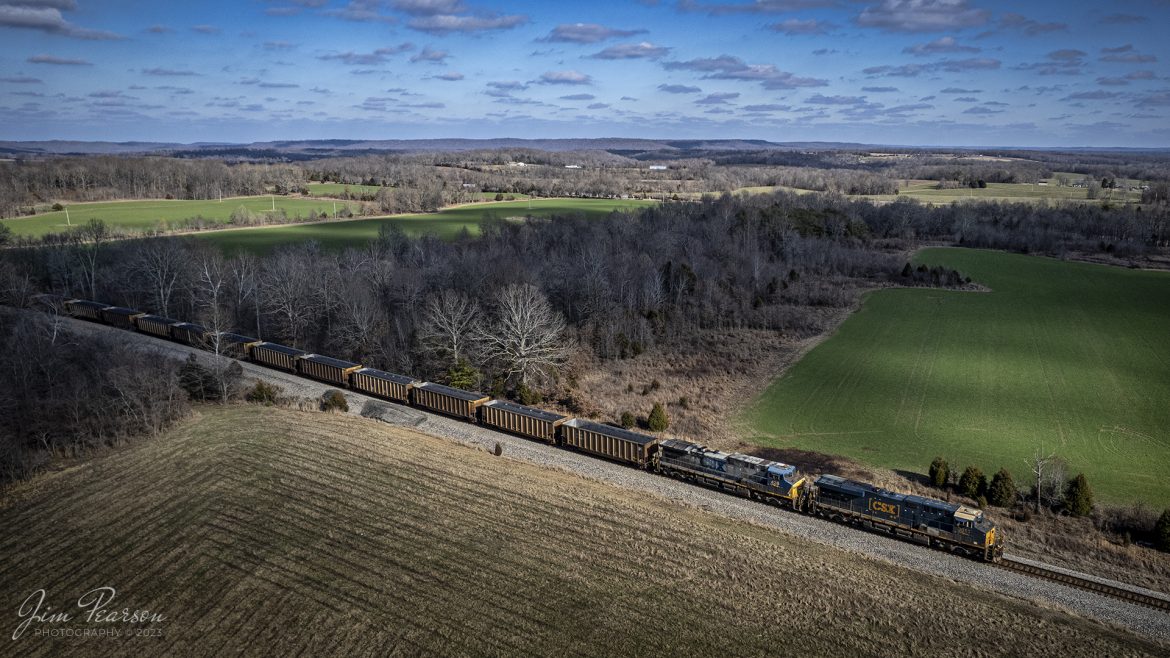 CSXT 3011 and 428 lead loaded coal train C002 through the countryside as they head south on the CSX Henderson Subdivision on January 23rd, 2023, just north of Kelly, Ky.

Tech Info: DJI Mavic Air 2S Drone, RAW, 22mm, f/2.8, 1/1500, ISO 120.

#trainphotography #railroadphotography #trains #railways #dronephotography #trainphotographer #railroadphotographer #jimpearsonphotography #trainsfromtheair#csxhendersonsubdivision