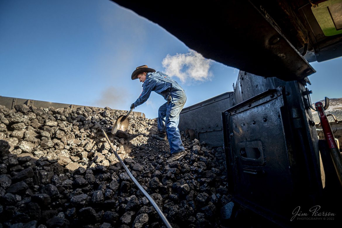 Here we find Nevada Northern Railway fireman Will Ebbert, as he shovels coal in the tender of locomotive 81, as they head toward Hi Line Junction, outside Ely, Nevada on February 13th, 2022. 

Nevada Northern No. 81 is a "Consolidation" type (2-8-0) steam locomotive that was built for the Nevada Northern in 1917 by the Baldwin Locomotive Works in Philadelphia, PA, at a cost of $23,700. It was built for Mixed service to haul both freight and passenger trains on the Nevada Northern railway.

According to Wikipedia: The Nevada Northern Railway Museum is a railroad museum and heritage railroad located in Ely, Nevada and operated by a historic foundation dedicated to the preservation of the Nevada Northern Railway.

Tech Info: Nikon D800, RAW, Nikon 10-24 @ 10mm, f/3.5, 1/320, ISO 500.

#trainphotography #railroadphotography #trains #railways #jimpearsonphotography #trainphotographer #railroadphotographer #steamtrains #nevadanorthernrailway