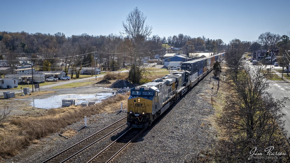 CSXT 1776, Honoring our Veterans Unit leads CSX I028 northbound through downtown Sebree, KY, on the Henderson Subdivision on November 30th, 2022 with a loaded intermodal train.

On April 30, 2019, CSX unveiled locomotives 911 and this one, 1776. The two locomotives were created to honor the first responders and veterans. Another special unit, CSX 3194, was unveiled on August 22, 2019, in honor of the law enforcement.

Tech Info: DJI Mavic Air 2 Drone, RAW, 4.5mm (24mm equivalent lens) f/2.8, 1/2000, ISO 110.

#trainphotography #railroadphotography #trains #railways #dronephotography #trainphotographer #railroadphotographer #jimpearsonphotography #trainsfromadrone #trainsfromtheair #kentuckytrains #csx911engine