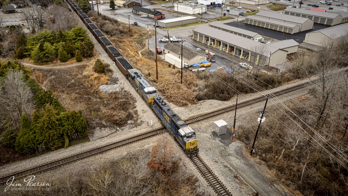 CSX C002 crosses over the diamond at Trident on the Henderson Subdivision, after coming off the Morganfield Branch after picking up a load of coal from Warrior Coal mine, as they head into CSX Atkinson Yard at Madisonville, Ky on January 25th, 2023. 

Tech Info: DJI Mavic Air 2S Drone, RAW, 22mm, f/2.8, 1/120, ISO 120.

#trainphotography #railroadphotography #trains #railways #dronephotography #trainphotographer #railroadphotographer #jimpearsonphotography #trainsfromtheair #csxhendersonsubdivision #kentuckytrains