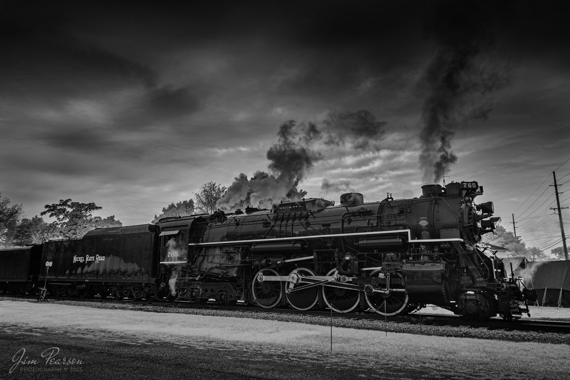 An Infrared shot of the American History Train, being led by Nickel Plate Road (NKP) steam locomotive 765, as it waits to depart on September 24th, 2022, from Pleasant Lake, Indiana.

NKP 765 was pulling the American History Train between Pleasant Lake from Angola, Indiana during the annual American History Days Festival. It took guests back to the 1940s for a living history experience. The passengers then got a 45-minute layover at Pleasant Lake where they visited with WWII reenactors, listened to live music and much more.

According to Wikipedia: Nickel Plate Road 765 is a class "S-2" 2-8-4 "Berkshire" type steam locomotive built for the New York, Chicago & St. Louis Railroad, commonly referred to as the "Nickel Plate Road".

No. 765 continues to operate in mainline excursion service and is owned and maintained by the Fort Wayne Railroad Historical Society and was also added to the National Register of Historic Places on September 12, 1996.

Tech Info: Fuji XT-1, RAW, Converted to 720nm B&W IR, Nikon 10-24 @ 17mm, f/4.5, 1/60, ISO 200.

#trainphotography #railroadphotography #trains #railways #jimpearsonphotography #infraredtrainphotography #infraredphotography #trainphotographer #railroadphotographer #steamtrains #nkp765