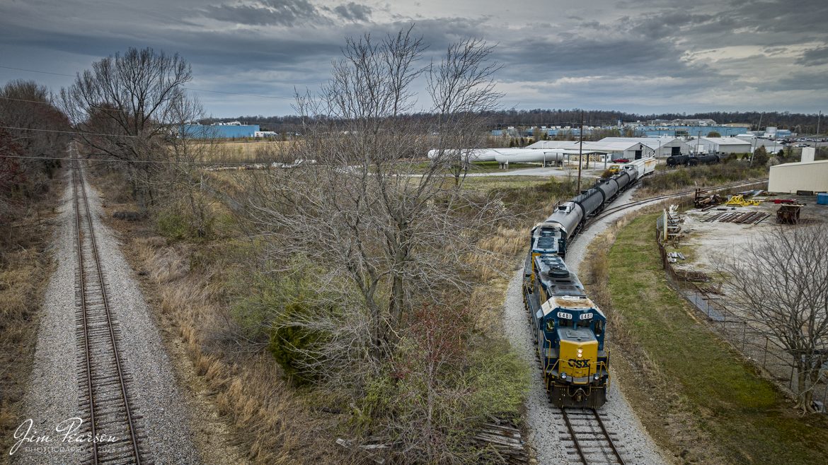 CSXT 6481 leads local L385 as they deliver tank cars of LP Gas to Fortner Gas in Madisonville, Ky, just off the CSX Morganfield Branch on March 16th, 2023, under stormy skies.

Tech Info: DJI Mavic 3 Classic Drone, RAW, 24mm, f/2.8, 1/1000, ISO 150.

#trainphotography #railroadphotography #trains #railways #dronephotography #trainphotographer #railroadphotographer #jimpearsonphotography #kentuckytrains #csx #csxrailway #csxhendersonsubdivision #mavic3classic #drones #trainsfromtheair #trainsfromadrone #unionpacificrailroad #madisonvilleky