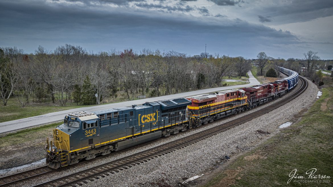 CSX B244, an empty potash train departs the siding at the north end of Kelly, Kentucky on the CSX Henderson Subdivision, on March 31st, 2023. CSX B244 is a fairly new, as-needed potash train off the CP that runs between Chicago, IL and Tampa, FL. The power on this move is CSX 3443, KCS 4728, CP 8933 and CP 8021.

Tech Info: DJI Mavic 3 Classic Drone, RAW, 24mm, f/2.8, 1/1250, ISO 230.

#trainphotography #railroadphotography #trains #railways #dronephotography #trainphotographer #railroadphotographer #jimpearsonphotography #kentuckytrains #csx #csxrailway #KellyKy #mavic3classic #drones #trainsfromtheair #trainsfromadrone #csxhendersonsubdivison