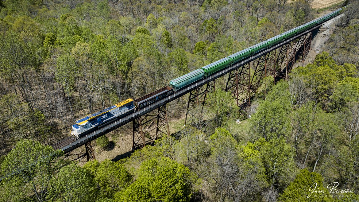 CSX X513 passes over Gum Lick Trestle, between Crofton and Robards, Ky, with the CSX Operation Lifesaver 50th Anniversary locomotive CSXT 4568 leading, as they make their way south on the Henderson Subdivision on April 12th, 2023.

According to a CSX press release: CSX unveiled a new OLI rail safety commemorative locomotive in September of 2022, and it was painted at the railroads locomotive shop in Huntington, West Virginia. The CSXT 4568 engine will travel the companys rail network as a visual reminder for the public to be safe at highway-rail grade crossings and near railroad tracks.

Tech Info: DJI Mavic 3 Classic Drone, RAW, 24mm, f/2.8, 1/1000, ISO 100.

#trainphotography #railroadphotography #trains #railways #dronephotography #trainphotographer #railroadphotographer #jimpearsonphotography #kentuckytrains #csx #csxrailway #HopkinsvilleKy #mavic3classic #drones #trainsfromtheair #trainsfromadrone #csxhendersonsubdivison