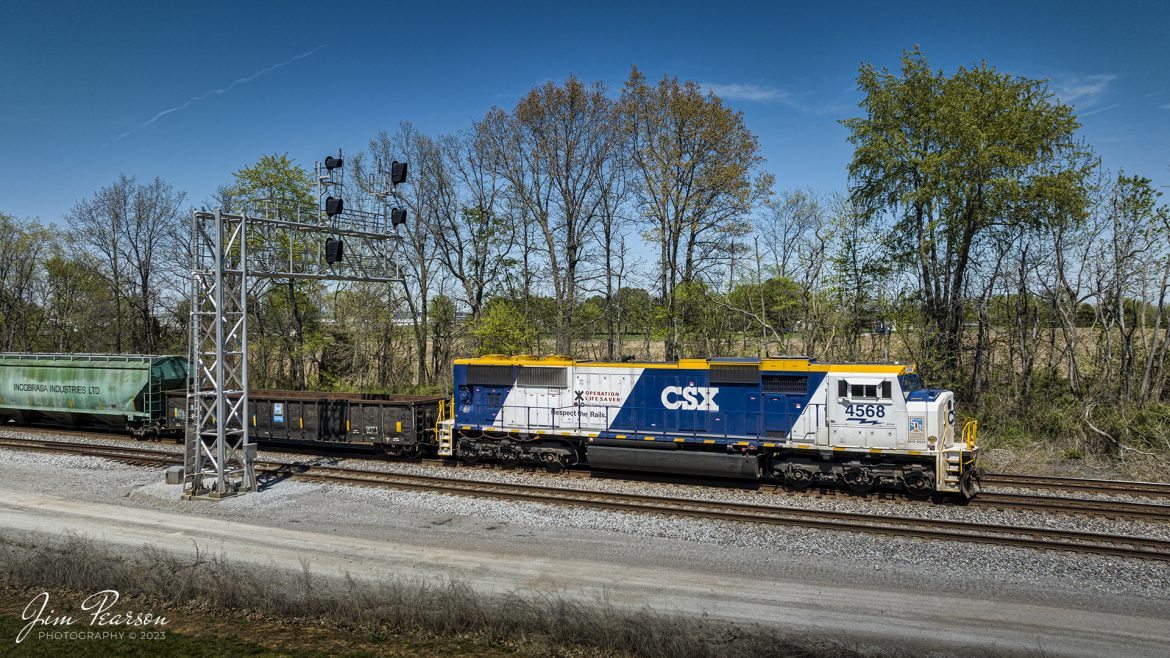 CSX X513 passes through the signals at the north end of Casky with the CSX Operation Lifesaver locomotive CSXT 4568 leading, as they make their way south on the Henderson Subdivision on April 12th, 2023, at Hopkinsville, Ky.

According to a CSX press release: CSX unveiled a new OLI rail safety commemorative locomotive in September of 2022, and it was painted at the railroads locomotive shop in Huntington, West Virginia. The CSXT 4568 engine will travel the companys rail network as a visual reminder for the public to be safe at highway-rail grade crossings and near railroad tracks.

Tech Info: DJI Mavic 3 Classic Drone, RAW, 24mm, f/2.8, 1/2000, ISO 100.

#trainphotography #railroadphotography #trains #railways #dronephotography #trainphotographer #railroadphotographer #jimpearsonphotography #kentuckytrains #csx #csxrailway #HopkinsvilleKy #mavic3classic #drones #trainsfromtheair #trainsfromadrone #csxhendersonsubdivison