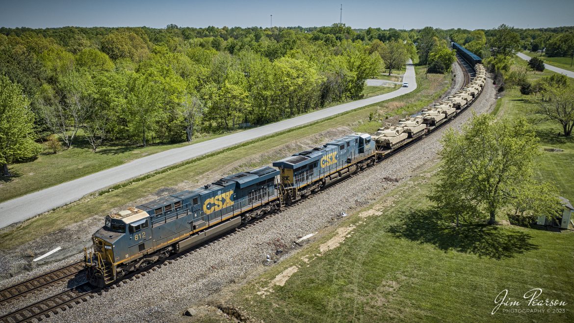 CSX M512 with 8 flats of M1 Tanks departs from the north end of Kelly, Ky on April 25th, 2023, on the Henderson Subdivision. The loads behind the tanks are truck frames.

Tech Info: DJI Mavic 3 Classic Drone, RAW, 24mm, f/2.8, 1/1600, ISO 130.

#trainphotography #railroadphotography #trains #railways #dronephotography #trainphotographer #railroadphotographer #jimpearsonphotography #kentuckytrains #KellyKy #mavic3classic #drones #trainsfromtheair #trainsfromadrone #csxhendersonsubdivision #kellyky #militarytrainmove