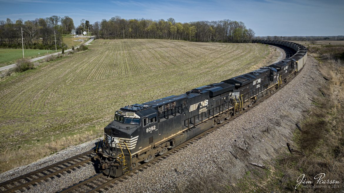 Norfolk Southern 8092, 3619 and 3613 lead a loaded coal train as they pull into the west end of the yard at Princeton, Indiana on April 8th, 2023, with a loaded Duke Energy coal train, bound for the Gibson Generating Station at Edwardsport, IN.

According to Wikipedia: The Gibson Generating Station was originally built as a two-unit coal-fired power plant in 1972 by Public Service Indiana (PSI) with initial plans to build 8 units. The 1970s saw the addition of Units 3, 4. However, environmental regulations prevented the construction of the two remaining additional units in the original plan. In 1982, Unit 5 was constructed, and two more stacks were added. In the 1990s, number 4 was separated from number 3's stack, and each was given its own stack, while Units 1 and 2 continued to share a stack.

Tech Info: DJI Mavic 3 Classic Drone, RAW, 24mm, f/2.8, 2000, ISO 110.

#trainphotography #railroadphotography #trains #railways #dronephotography #trainphotographer #railroadphotographer #jimpearsonphotography #trains #csx #csxrailway #Indianatrains #mavic3classic #drones #trainsfromtheair #trainsfromadrone #norfolksouthernrailway, #coaltrain #dukeenergyplant