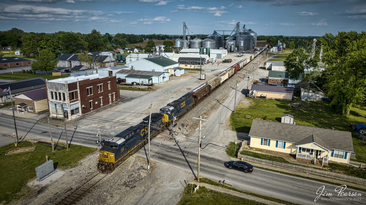 CSX M512 passes through downtown Pembroke, Kentucky as it heads north on May 6th, 2023, on the CSX Henderson Subdivision.

Tech Info: DJI Mavic 3 Classic Drone, RAW, 24mm, f/2.8, 1/1600, ISO 100.

#trainphotography #railroadphotography #trains #railways #dronephotography #trainphotographer #railroadphotographer #jimpearsonphotography #trains #csx #csxrailway #kentuckytrains #mavic3classic #drones #trainsfromtheair #trainsfromadrone #CSXT #PembrokeKy