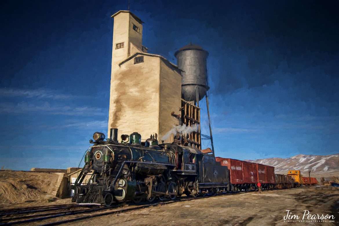 Digital Photo Art - Nevada Northern Railway steam locomotive #81 pulls a short mixed freight past the coaling tower at Ely, Nevada during the museums Winter Photo Charter event on the morning of February 13th, 2022.

According to Wikipedia: “The Nevada Northern Railway Museum is a railroad museum and heritage railroad located in Ely, Nevada and operated by a historic foundation dedicated to the preservation of the Nevada Northern Railway.

The museum is situated at the East Ely Yards, which are part of the Nevada Northern Railway. The site is listed on the United States National Register of Historic Places as the Nevada Northern Railway East Ely Yards and Shops and is also known as the "Nevada Northern Railway Complex". The rail yards were designated a National Historic Landmark District on September 27, 2006. The site was cited as one of the best-preserved early 20th-century railroad yards in the nation, and a key component in the growth of the region's copper mining industry. Developed in the first decade of the 20th century, it served passengers and freight until 1983, when the Kennecott Copper Company, its then-owner, donated the yard to a local non-profit for preservation. The property came complete with all the company records of the Nevada Northern from its inception.”

Engine #81 is a "Consolidation" type (2-8-0) steam locomotive that was built for the Nevada Northern in 1917 by the Baldwin Locomotive Works in Philadelphia, PA, at a cost of $23,700. It was built for Mixed service to haul both freight and passenger trains on the Nevada Northern railway.

Tech Info: Nikon D800, RAW, Nikon 10-24 @ 24mm, f/5, 1/800, ISO 160.

#trainphotography #railroadphotography #trains #railways #jimpearsonphotography #trainphotographer #railroadphotographer #steamtrains #nevadanorthernrailway