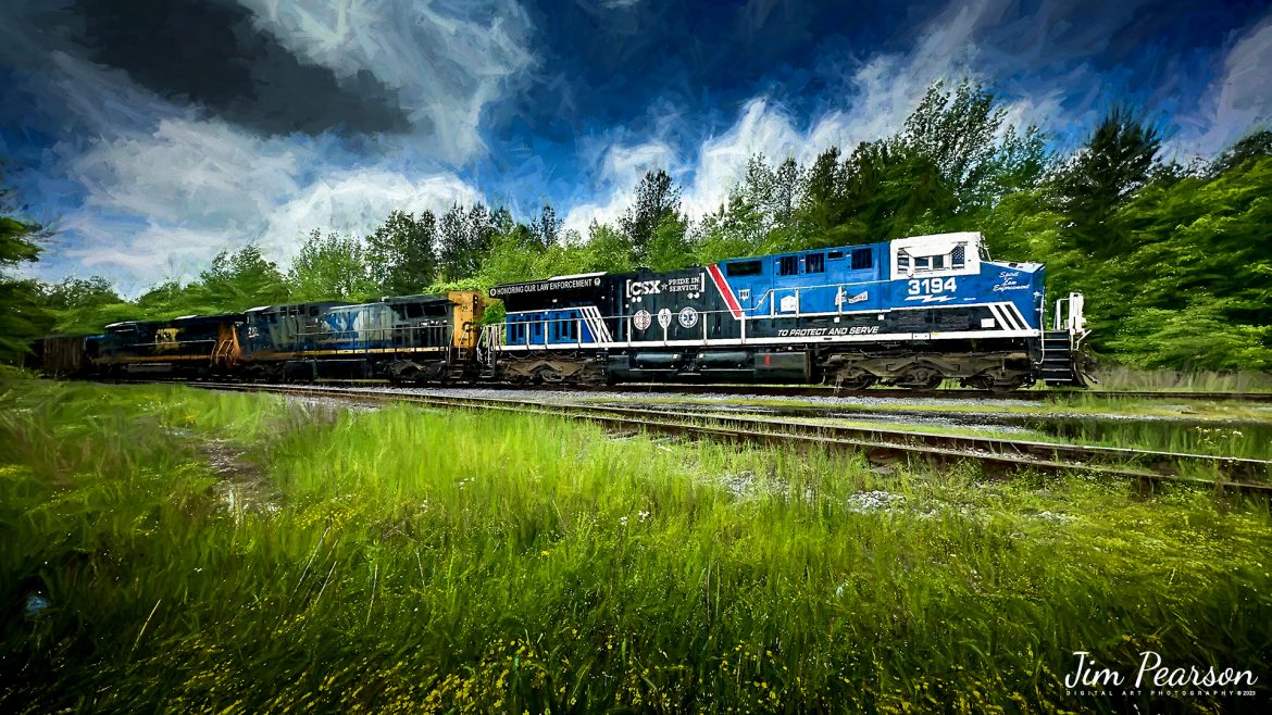 Digital Art Photo- CSX Honoring our Law Enforcement Unit, CSXT 3194, leads a loaded coal train into the loop at the Calvert City Terminal to deliver a load of coal at Calvert City, Ky on May 8th, 2023.

Tech Info: iPhone 14 Pro, 6.9 (24mm), f/1.8, 1/2251sec, ISO 50, in 4K video Mode.

#trainphotography #railroadphotography #trains #railways #iphonephotography #trainphotographer #railroadphotographer #jimpearsonphotography #csx #kentuckytrains #paducahandlouisvillerailway #iphone14pro #digitalphotoart