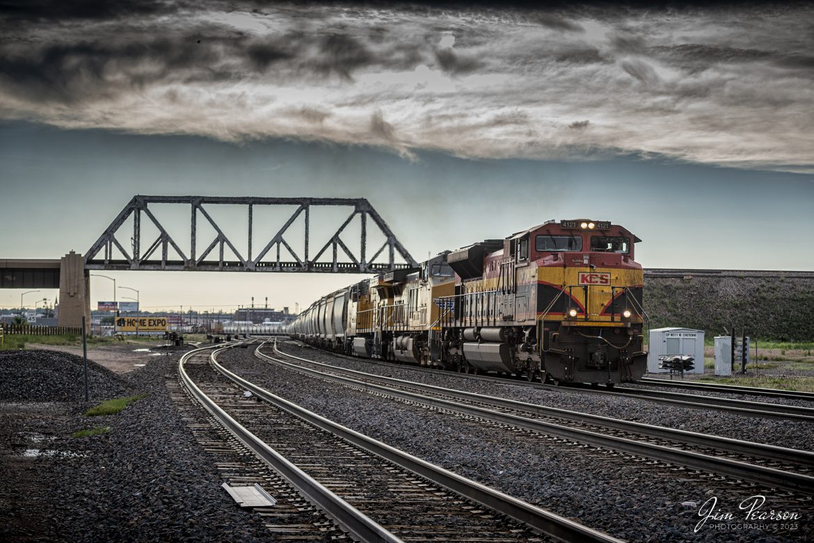 Kansas City Southern 4121 (Now CPKC) leads a Union Pacific train westbound out of the yard at Cheyenne, Wyoming on the Laramie Subdivision passing under the overpass for the Front Range Subdivision on March 18th, 2023 as it heads west.

Tech Info: Nikon D800, RAW, Nikon 70-300 @70mm, f/5.6, 1/1000, ISO 320.

#trainphotography #railroadphotography #trains #railways #dronephotography #trainphotographer #railroadphotographer #jimpearsonphotography #UPtrains #NikonD800 #UnionPacific #WyomingTrains #KCS #CPKC