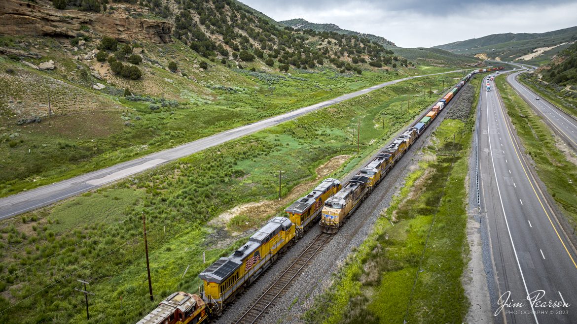 Union Pacific 5340 and UP 5673 pass each other as the pair of trains meet in Echo Canyon, Utah, as they head east and west along the Evanston Subdivision, on June 19th, 2023.

Tech Info: DJI Mavic 3 Classic Drone, RAW, 24mm, f/2.8, 1/640, ISO 160.

#trainphotography #railroadphotography #trains #railways #dronephotography #trainphotographer #railroadphotographer #jimpearsonphotography #trains #unionpacific #mavic3classic #drones #trainsfromtheair #trainsfromadrone #UtahTrains