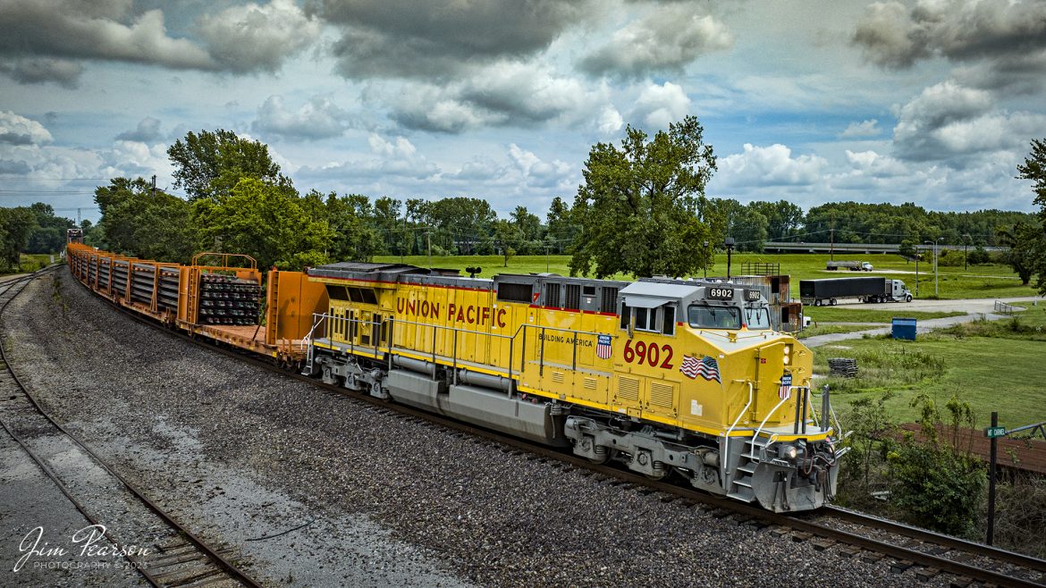 A clean, shinny Union Pacific 6902 leads a loaded rail train as it heads west on the Norfolk Southern West District at Mt. Carmel, Illinois on July 8th, 2023. 

Tech Info: DJI Mavic 3 Classic Drone, RAW, 24mm, f/2.8, 1/2500, ISO 150.

#trainphotography #railroadphotography #trains #railways #dronephotography #trainphotographer #railroadphotographer #jimpearsonphotography #TennesseeTrains #csx #csxrailway #AdamsTN #mavic3classic #drones #trainsfromtheair #trainsfromadrone #nssouthernwestdistrict #norfolksouthern #unionpacific #railtrain