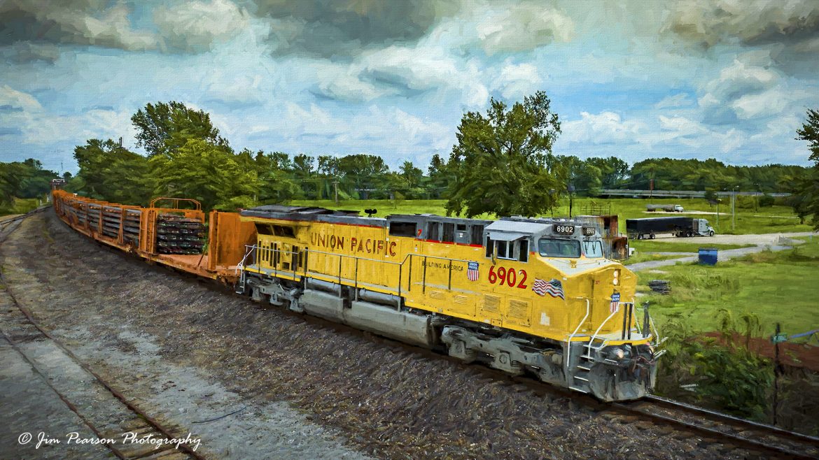 Digital ART Photo - A clean, shinny Union Pacific 6902 leads a loaded rail train as it heads west on the Norfolk Southern West District at Mt. Carmel, Illinois on July 8th, 2023. 

Tech Info: DJI Mavic 3 Classic Drone, RAW, 24mm, f/2.8, 1/2500, ISO 150.

#trainphotography #railroadphotography #trains #railways #dronephotography #trainphotographer #railroadphotographer #jimpearsonphotography #IllinoisTrains #up #UPrailroad #AdamsTN #mavic3classic #drones #trainsfromtheair #trainsfromadrone #nssouthernwestdistrict #norfolksouthern #unionpacific #railtrain
