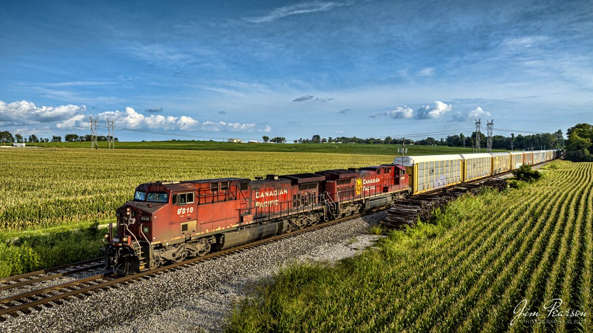 Canadian Pacific 9818 and 8004 head up X512 with a full load of autoracks from Toyota at Princeton, Indiana as they roll north through the countryside, just north of Decker, Indiana on the CSX CE&D Subdivision on August 26th, 2023.

Tech Info: DJI Mavic 3 Classic Drone, RAW, 24mm, f/2.8, 1/1600, ISO 100.

#trainphotography #railroadphotography #trains #railways #dronephotography #trainphotographer #railroadphotographer #jimpearsonphotography #trains #mavic3classic #drones #trainsfromtheair #trainsfromadrone #Indianatrains #autoracks