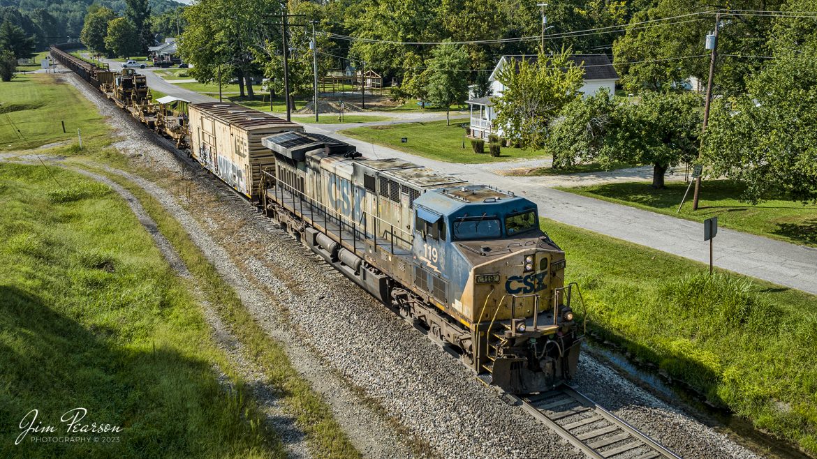 CSXT 119 leads W016, a loaded rail train, through downtown Mortons Gap, Kentucky on August 25th, 2023, as it heads north on the Henderson Subdivision. 

Tech Info: DJI Mavic 3 Classic Drone, RAW, 24mm, f/2.8, 1/2000, ISO 120.

#trainphotography #railroadphotography #trains #railways #dronephotography #trainphotographer #railroadphotographer #jimpearsonphotography #trains #mavic3classic #drones #trainsfromtheair #trainsfromadrone #Railtrain #HansonKy