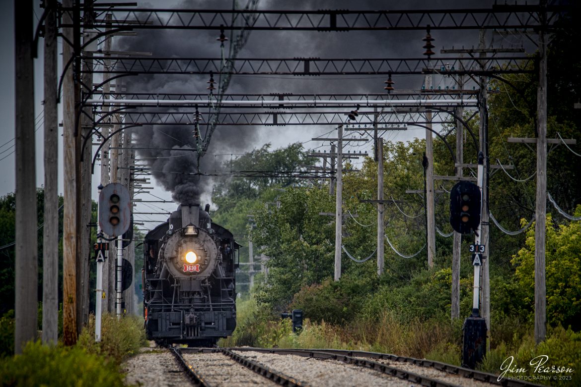 Frisco 1630 approaches the siding at the Seeman Road crossing at Union, Illinois as it heads east with a passenger train, during the 70th Anniversary Weekend Celebration for the Illinois Railway Museum at Union on September 16th, 2023.

According to the IRM website: St. Louis  San Francisco Railroad (Frisco) 1630 is the museums most famous steam engine. A Russian Decapod, it was built in 1918 for export to Russia but was embargoed when the Bolshevik Revolution took place. Instead, the newly completed engine was sold to the Frisco, which used it in both freight and passenger service into the 1950s. The Frisco later sold it to Eagle-Picher Mining, where it saw use hauling freight and aggregate trains until the mid-1960s. It arrived at the IRM in 1967.

Tech Info: Nikon D800, Nikon Sigma 150-600 @ 600mm, f/6.3, 1/1250, ISO 1000.

#trainphotography #railroadphotography #trains #railways #trainphotographer #railroadphotographer #jimpearsonphotography #PassengerTrain #IllinoisRailwayMuseum #IllinoisTrains #Frisco1630 #SteamTrains