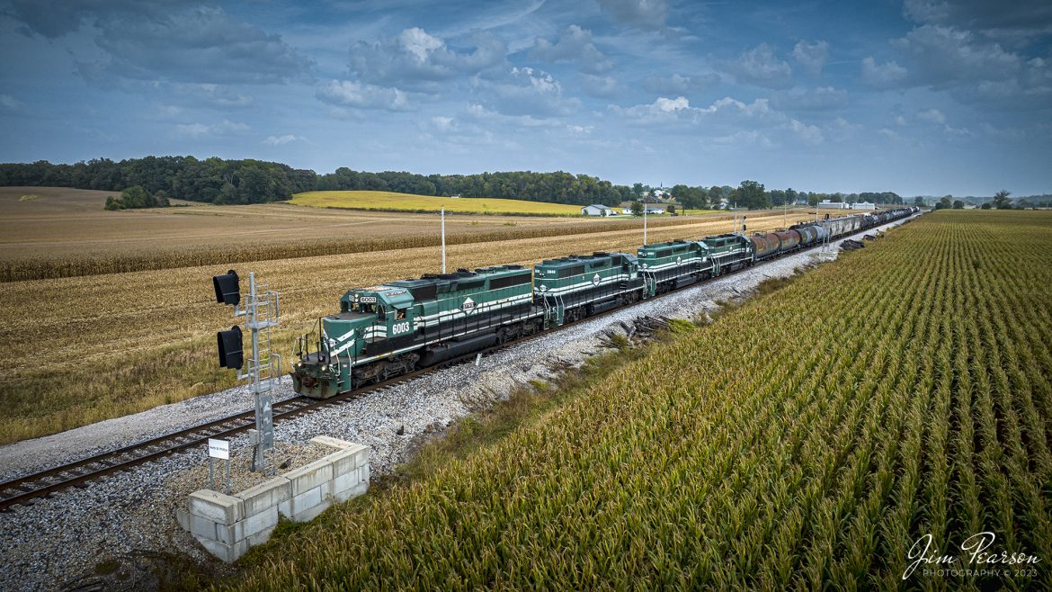 Evansville Western Railway 6003 leads the daily local as they pass the siding at Abee, Indiana on their way back to Mount Vernon, IN, from performing their interchange work with CSX at Howell Yard in Evansville, IN on October 4th, 2023.

Tech Info: DJI Mavic 3 Classic Drone, RAW, 22mm, f/8, 1/1600, ISO 120.

#trainphotography #railroadphotography #trains #railways #jimpearsonphotography #trainphotographer #railroadphotographer #EVWR #dronephoto #trainsfromadrone #IndianaTrains #shortline #regionalrailroad