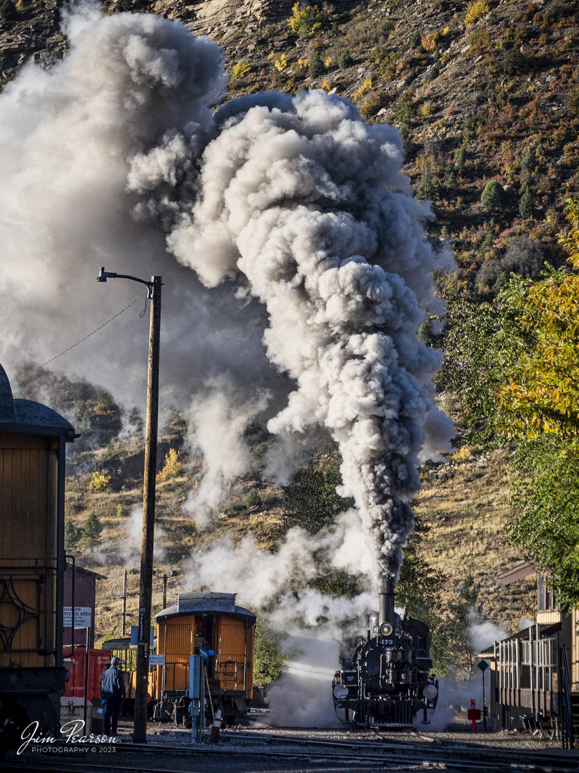 Denver and Rio Grande Western 473 pulls through the yard at Durango, Colorado, on October 15th, 2023, as it prepares to hook up to one of the daily passenger trains, bound for Silverton, CO.

According to Wikipedia: The Durango and Silverton Narrow Gauge Railroad, often abbreviated as the D&SNG, is a 3 ft (914 mm) narrow-gauge heritage railroad that operates on 45.2 mi (72.7 km) of track between Durango and Silverton, in the U.S. state of Colorado. The railway is a federally designated National Historic Landmark and was also designated by the American Society of Civil Engineers as a National Historic Civil Engineering Landmark in 1968.

Tech Info: Nikon D810, RAW, Sigma 24-70 @56mm, f/5.6, 1/500, ISO 110.

railroad, railroads train, trains, best photo. sold photo, railway, railway, sold train photos, sold train pictures, steam trains, rail transport, railroad engines, pictures of trains, pictures of railways, best train photograph, best photo, photography of trains, steam train photography, sold picture, best sold picture, Jim Pearson Photography, Durango and Silverton Railroad