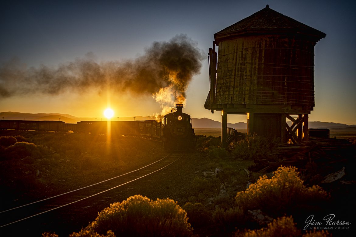 Cumbres & Toltec Scenic Railroad steam locomotive 463 leads an early morning freight past the Lata water tank. as it heads west at sunrise, out of Antonito, Colorado, during a photo charter by Dak Dillon Photography on October 19th, 2023.

According to their website: the Cumbres & Toltec Scenic Railroad is a National Historic Landmark.  At 64-miles in length, it is the longest, the highest and most authentic steam railroad in North America, traveling through some of the most spectacular scenery in the Rocky Mountain West.

Owned by the states of Colorado and New Mexico, the train crosses state borders 11 times, zigzagging along canyon walls, burrowing through two tunnels, and steaming over 137-foot Cascade Trestle. All trains steam along through deep forests of aspens and evergreens, across high plains filled with wildflowers, and through a rocky gorge of remarkable geologic formations. Deer, antelope, elk, fox, eagles and even bear are frequently spotted on this family friendly, off-the grid adventure.

Tech Info: Nikon D810, RAW, Sigma 24-70 @ 42mm, f/3.2, 1/4000, ISO 64.

railroad, railroads train, trains, best photo. sold photo, railway, railway, sold train photos, sold train pictures, steam trains, rail transport, railroad engines, pictures of trains, pictures of railways, best train photograph, best photo, photography of trains, steam train photography, sold picture, best sold picture, Jim Pearson Photography, Cumbres & Toltec Scenic Railroad