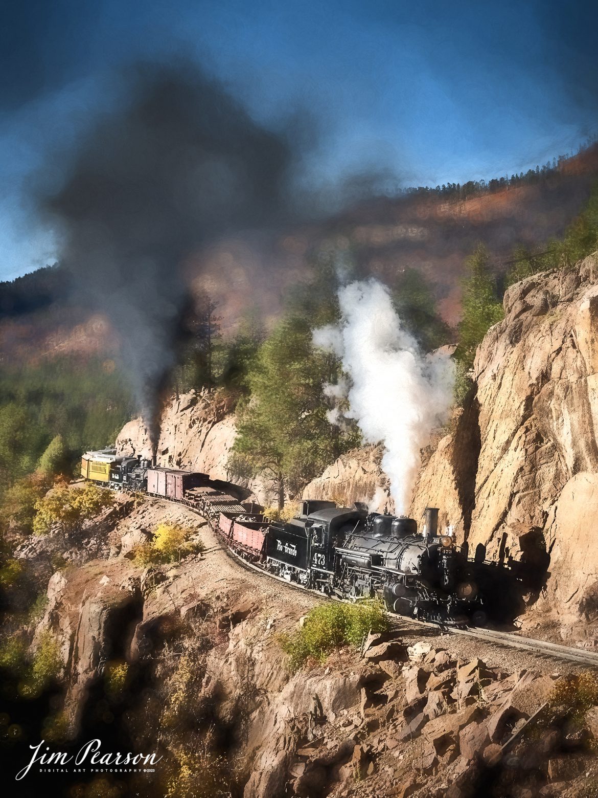 Durango and Silverton Narrow Guage steam locomotive D&RGW 473 pulls a K-28 100th Anniversary Special with D&RGW 476 as a mid-train helper through the Repeating Curves at MP 472.2, along the Animas River, between Durango and Silverton, Colorado, on October 16th, 2023.

According to Wikipedia: The Durango and Silverton Narrow Gauge Railroad, often abbreviated as the D&SNG, is a 3 ft (914 mm) narrow-gauge heritage railroad that operates on 45.2 mi (72.7 km) of track between Durango and Silverton, in the U.S. state of Colorado. The railway is a federally designated National Historic Landmark and was also designated by the American Society of Civil Engineers as a National Historic Civil Engineering Landmark in 1968.

Tech Info: Nikon D810, RAW, Sigma 24-70 @ 24mm, f/5.6, 1/640, ISO 160.

railroad, railroads train, trains, best photo. sold photo, railway, railway, sold train photos, sold train pictures, steam trains, rail transport, railroad engines, pictures of trains, pictures of railways, best train photograph, best photo, photography of trains, steam, train photography, sold picture, best sold picture, Jim Pearson Photography, Durango and Silverton Narrow Guage Railroad, steam train, DRGWRR