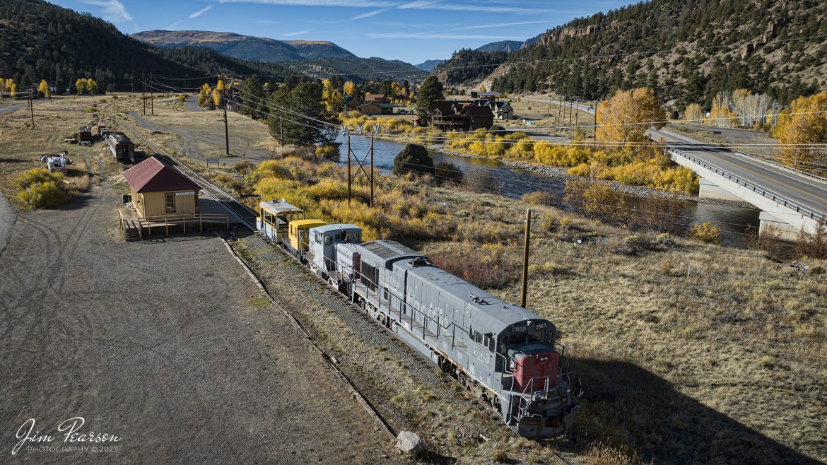 Denver and Rio Grande Western 7863, ex-Southern Pacific 7863, sits next to the old depot at South Fork, Colorado on October 18th, 2023, along with several other pieces of equipment.

From what I can find online the depot is now used by Revolution Rail Company for a railbike operation. Here’s what they say on their website: After checking-in at the South Fork Railroad Station, rail bikers will receive a short safety briefing and the tour guides will lead the 6-mile out-and-back trip. Riders on the South Fork Run enjoy a gorgeous ride alongside the Rio Grande, featuring spectacular views of the surrounding terrain and vistas.

Feeling adventurous? We are now offering a Pedals and Paddles combo trip! Guides will lead guests on a 5-mile one way railbike trip that includes expansive vistas of the Rio Grande and Coller State Wildlife Area. Arriving at the rafting put-in, guests will join our partners Rocky Mountain Ski and Raft who will provide all equipment and safety instruction before beginning the 6-mile Rio Grande paddle excursion back to the Depot, for a perfect day in the San Luis Valley.

Tech Info: DJI Mavic 3 Classic Drone, RAW, 22mm, f/2.8, 1/1600, ISO 120.

railroad, railroads train, trains, best photo. sold photo, railway, railway, sold train photos, sold train pictures, steam trains, rail transport, railroad engines, pictures of trains, pictures of railways, best train photograph, best photo, photography of trains, steam, train photography, sold picture, best sold picture, Jim Pearson Photography, DRGRR, Trains from the air, drone, South Fork Colorado