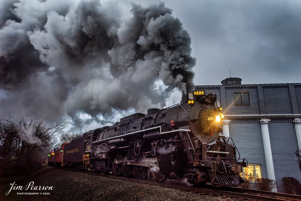 Pere Marquette 1225 heads out of Owosso, Michigan at dusk with the last North Pole Express excursion between Owosso and the Village of Ashley Country Christmas for the year, on December 17th, 2023. 

According to their website, Pere Marquette 1225, the largest and most impressive piece in the Steam Railroading Institute’s collection, is one of the largest operating steam locomotives in Michigan. The 1225 was built in October of 1941 by the Lima Locomotive Works in Lima, Ohio for the Pere Marquette Railway. It’s part of the National Register of Historic Structures and is renowned for its role in the 2004 Warner Brothers Christmas Classic, THE POLAR EXPRESS™. 1225’s blueprints were used as the prototype for the locomotive image as well as its sounds to bring the train in the animated film to life!

Tech Info: Nikon D810, RAW, Sigma 24-70 @ 24mm, f/2.8, 1/250, ISO 4500.

railroad, railroads train, trains, best photo. sold photo, railway, railway, sold train photos, sold train pictures, steam trains, rail transport, railroad engines, pictures of trains, pictures of railways, best train photograph, best photo, photography of trains, steam, train photography, sold picture, best sold picture, Jim Pearson Photography, Pere Marquette 1225, Steam Railroading Institute