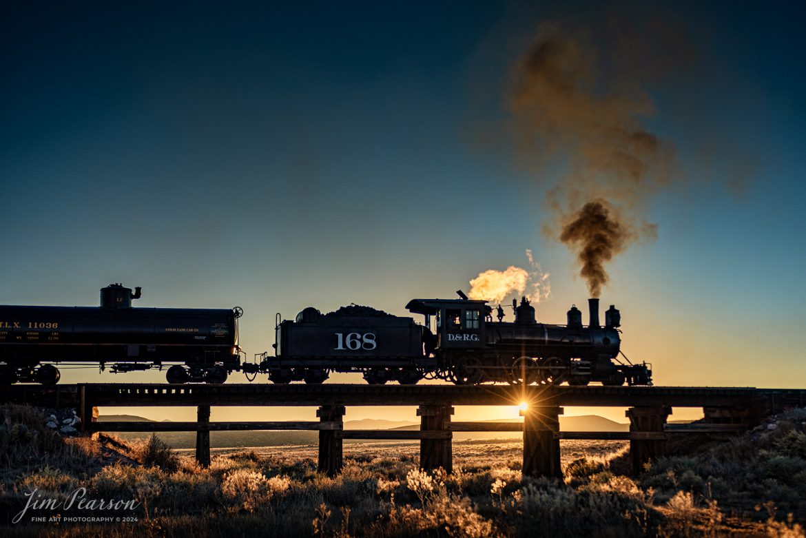 Cumbres & Toltec Scenic Railroad steam locomotive D&RGW 168 passes over Ferguson's Trestle at MP 285.87 at sunrise as it heads to Osier, Colorado, during a photo charter by Dak Dillon Photography on October 20th, 2023.

According to their website: the Cumbres & Toltec Scenic Railroad is a National Historic Landmark.  At 64-miles in length, it is the longest, the highest and most authentic steam railroad in North America, traveling through some of the most spectacular scenery in the Rocky Mountain West.

Owned by the states of Colorado and New Mexico, the train crosses state borders 11 times, zigzagging along canyon walls, burrowing through two tunnels, and steaming over 137-foot Cascade Trestle. All trains steam along through deep forests of aspens and evergreens, across high plains filled with wildflowers, and through a rocky gorge of remarkable geologic formations. Deer, antelope, elk, fox, eagles and even bear are frequently spotted on this family friendly, off-the grid adventure.

Tech Info: Nikon D810, RAW, Sigma 24-70 @ 40mm, f/3.2, 1/1600, ISO 80.

#railroad #railroads #train #trains #bestphoto #railroadengines #picturesoftrains #picturesofrailway #bestphotograph #photographyoftrains #trainphotography #JimPearsonPhotography #DurangoandSilvertonRailroad #trending
