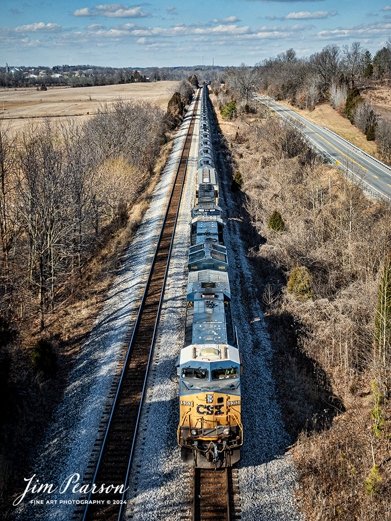CSX 5353 leads loaded ethanol train B795 as it sits in the siding at the south end of Slaughters, Kentucky, on February 15th, 2024, on the Henderson Subdivision, waiting on a meet with an empty coal train headed north.

Tech Info: DJI Mavic 3 Classic Drone, RAW, 22mm, f/2.8, 1/2000, ISO 130.

#trainphotography #railroadphotography #trains #railways #jimpearsonphotography #trainphotographer #railroadphotographer #csxt #dronephoto #trainsfromadrone #CSXHendersonsubdivision #trending