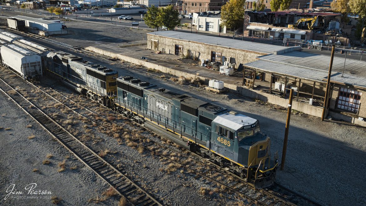 During my trip to Colorado in 2023 to chase steam we stayed in Alamosa for the Cumbres and Toltec portion of the trip. On October 18th, 2023, I captured this view of PRLX (Progress Rail Leasing) 4685 and 4687, both ex-CSX SD70 units, sitting in the Colorado Pacific Rio Grande Railroad (SL&RG) yard there. 

Tech Info: DJI Mavic 3 Classic Drone, RAW, 22mm, f/8, 1/1250, ISO 220.

#trainphotography #railroadphotography #trains #railways #jimpearsonphotography #trainphotographer #railroadphotographer #dronephoto #trainsfromadrone #ColoradoTrains