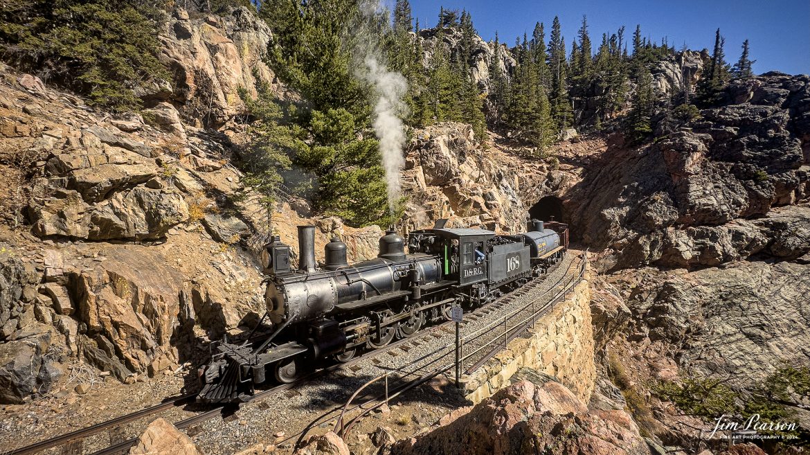 Cumbres & Toltec Scenic Railroad steam locomotive D&RGW 168 exits Rock Tunnel as it heads to Osier, Colorado, during a photo charter by Dak Dillon Photography on October 20th, 2023.

According to their website: the Cumbres & Toltec Scenic Railroad is a National Historic Landmark.  At 64-miles in length, it is the longest, the highest and most authentic steam railroad in North America, traveling through some of the most spectacular scenery in the Rocky Mountain West.

Owned by the states of Colorado and New Mexico, the train crosses state borders 11 times, zigzagging along canyon walls, burrowing through two tunnels, and steaming over 137-foot Cascade Trestle. All trains steam along through deep forests of aspens and evergreens, across high plains filled with wildflowers, and through a rocky gorge of remarkable geologic formations. Deer, antelope, elk, fox, eagles and even bear are frequently spotted on this family friendly, off-the grid adventure.

Tech Info: iPhone 14 Pro, RAW, Wide Lens, f/2.2, 1/950, ISO 50.

#railroad #railroads #train #trains #bestphoto #railroadengines #picturesoftrains #picturesofrailway #bestphotograph #photographyoftrains #trainphotography #JimPearsonPhotography #CumbresToltecScenicRailroad #trending #iPhonePhotography