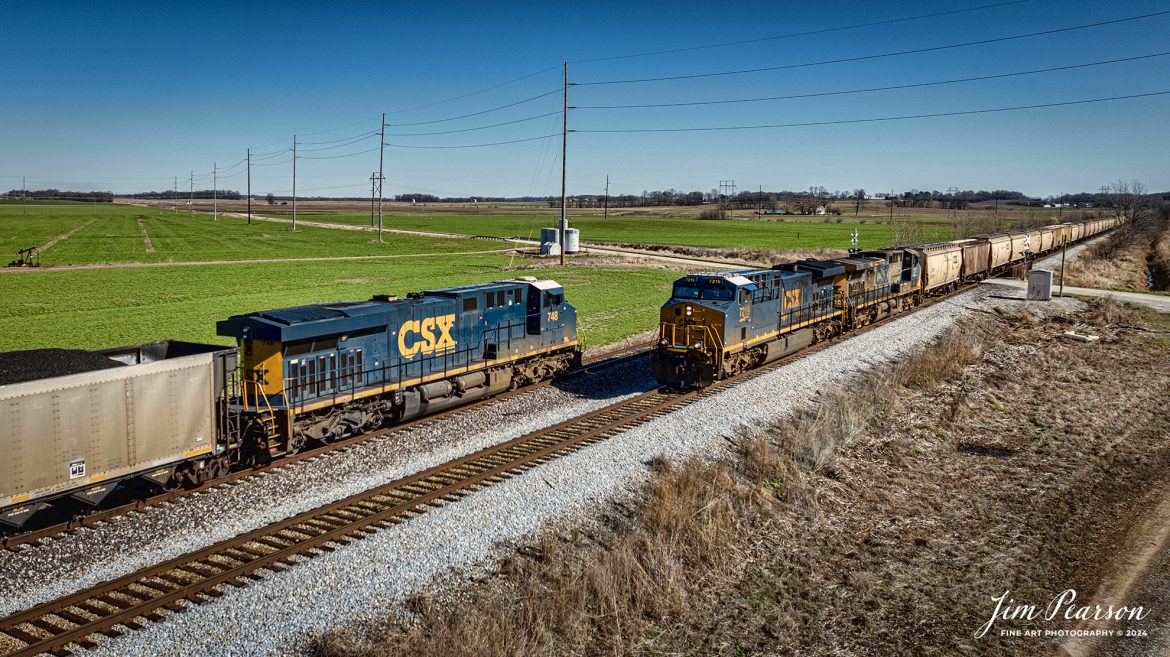 CSX locomotive 7219 leads an empty grain train as they meet a loaded coal train at Nations siding, on March 11th, 2024, as they head north on the Evansville Western Railway, just south of Mt. Vernon, Indiana.

Tech Info: DJI Mavic 3 Classic Drone, RAW, 22mm, f/2.8, 1/1600, ISO 100.

#trainphotography #railroadphotography #trains #railways #jimpearsonphotography #trainphotographer #railroadphotographer #csxt #dronephoto #trainsfromadrone #trending #evansvillewesternrailway