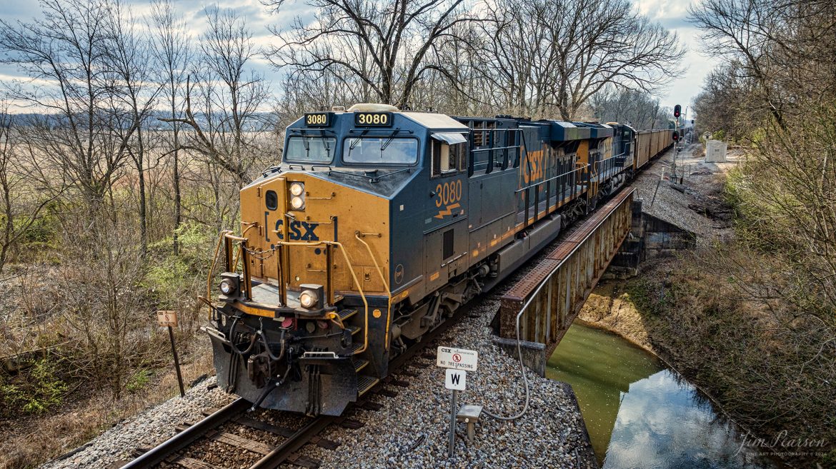 CSX locomotive 3080 leads empty coal train E321 as it passes over White Creek at the north end of the siding at Latham as they head north on the CSX Henderson Subdivision, on March 13th, 2024. This train runs between Cross, SC to Evansville, IN where it transfers to the Evansville and Western Railway who takes it to Sugar Camp Mine in southern Illinois.

Tech Info: DJI Mavic 3 Classic Drone, RAW, 22mm, f/2.8, 1/1250, ISO 230.

#trainphotography #railroadphotography #trains #railways #jimpearsonphotography #trainphotographer #railroadphotographer #csxt #dronephoto #trainsfromadrone #trending #csxhendersonsubdivision