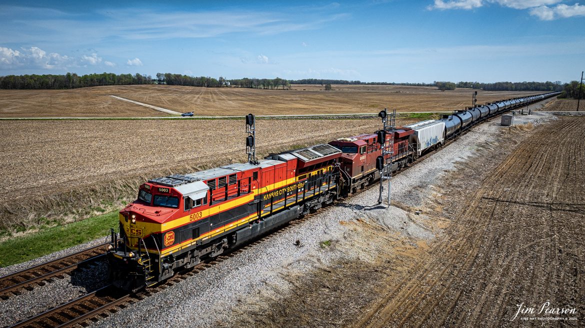 KCS 5003 leads empty ethanol train B622 as they pull into the siding at the south end of Rankin, Ky, where they waited for another northbound to pass them, as they head north on April 8th, 2024, on the CSX Henderson Subdivision.

Tech Info: DJI Mavic 3 Classic Drone, RAW, 22mm, f/2.8, 1/2000, ISO 140.