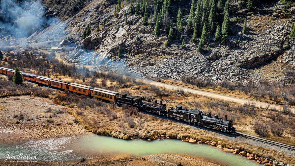 Denver and Rio Grande Western double header steam locomotives 473 and 493 pull one of several daily passenger trains north through Deadwood Gulch, as they approach Silverton, Colorado on October 15th, 2023.

According to Wikipedia: The Durango and Silverton Narrow Gauge Railroad, often abbreviated as the D&SNG, is a 3 ft (914 mm) narrow-gauge heritage railroad that operates on 45.2 mi (72.7 km) of track between Durango and Silverton, in the U.S. state of Colorado. The railway is a federally designated National Historic Landmark and was also designated by the American Society of Civil Engineers as a National Historic Civil Engineering Landmark in 1968.

Tech Info: DJI Mavic 3 Classic Drone, RAW, 22mm, f/2.8, 1/1000, ISO 110.

#railroad #railroads #train #trains #bestphoto #railroadengines #picturesoftrains #picturesofrailway #bestphotograph #photographyoftrains #trainphotography #JimPearsonPhotography #DurangoandSilvertonRailroad #trending