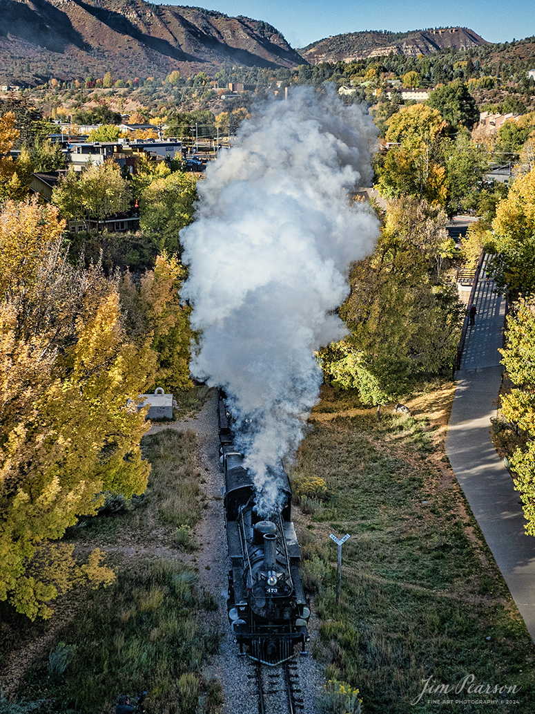 Denver and Rio Grande Western double header steam locomotives 473 and 493 pull south out of Durango with a daily passenger train, bound for Silverton, Colorado on October 15th, 2023.

According to Wikipedia: The Durango and Silverton Narrow Gauge Railroad, often abbreviated as the D&SNG, is a 3 ft (914 mm) narrow-gauge heritage railroad that operates on 45.2 mi (72.7 km) of track between Durango and Silverton, in the U.S. state of Colorado. The railway is a federally designated National Historic Landmark and was also designated by the American Society of Civil Engineers as a National Historic Civil Engineering Landmark in 1968.

Tech Info: DJI Mavic 3 Classic Drone, RAW, 22mm, f/2.8, 1/1600, ISO 140.

#railroad #railroads #train #trains #bestphoto #railroadengines #picturesoftrains #picturesofrailway #bestphotograph #photographyoftrains #trainphotography #JimPearsonPhotography #DurangoandSilvertonRailroad #trending