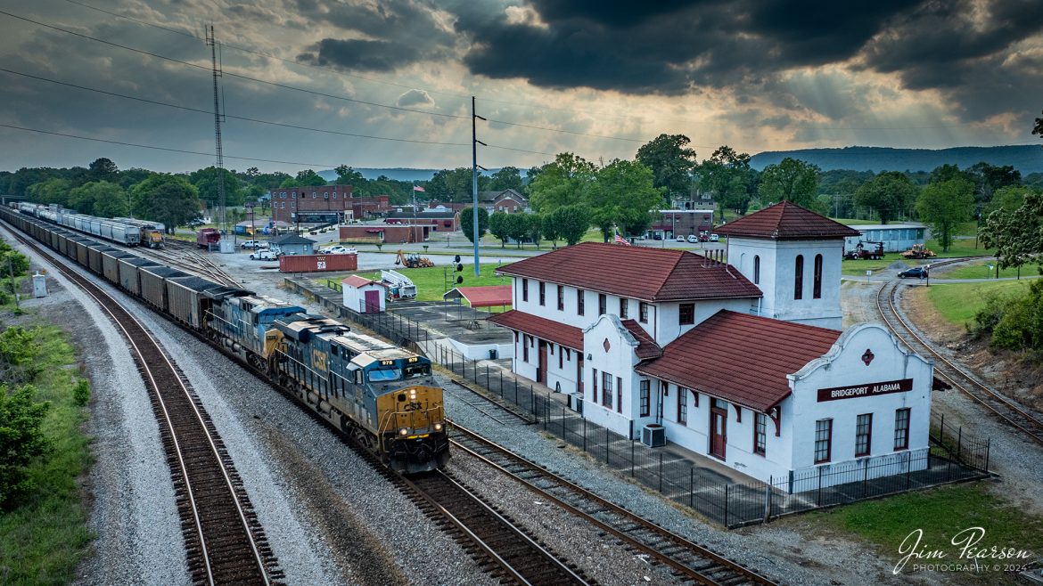 Loaded Coal train CSX 904 passes the old Spanish style depot at Bridgeport, Alabama as it heads south on the CSX Chattanooga Subdivision, on April 26th, 2024.

Tech Info: DJI Mavic 3 Classic Drone, RAW, 22mm, f/2.8, 1/1600, ISO 370.

#railroad #railroads #train #trains #bestphoto #railroadengines #picturesoftrains #picturesofrailway #bestphotograph #photographyoftrains #trainphotography #JimPearsonPhotography