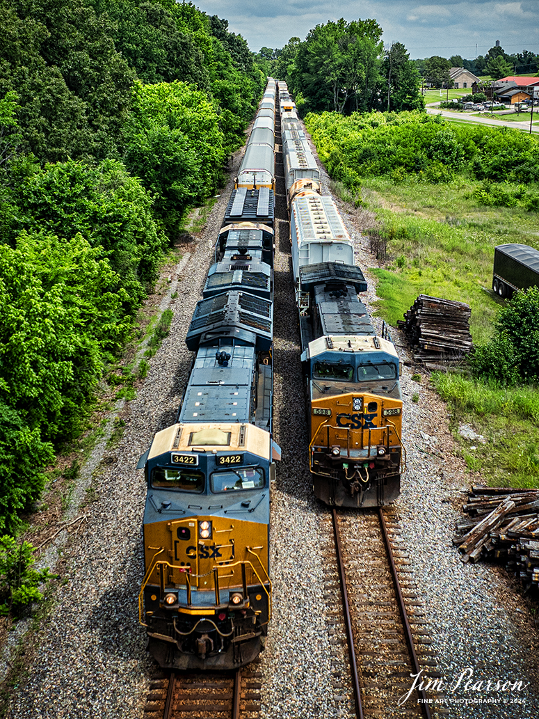 CSX 3433 Leads northbound intermodal I025 as it passes M513 at the north end of Sebree, Kentucky on May 25th, 2024, on the CSX Henderson Subdivision. The long line of autoracks on this train are filled with Tesla’s that are headed for Florida. They run them on this high priority train on a regular basis.

Tech Info: DJI Mavic 3 Classic Drone, RAW, 22mm, f/8, 1/1600, ISO 100.

#trainphotography #railroadphotography #trains #railways #jimpearsonphotography #trainphotographer #railroadphotographer #dronephoto #trainsfromadrone #CSX