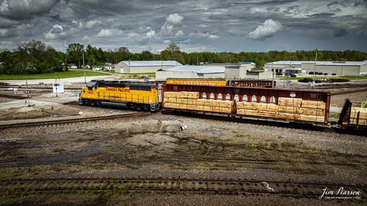 Union Pacific 1412 leads a local across the diamond at Mt. Vernon, Illinois as it heads east the Union Pacific Mount Vernon Subdivision, on April 25th, 2025, as they cross over the NS Southern East District.

Tech Info: DJI Mavic 3 Classic Drone, RAW, 24mm, f/2.8, 1/2500, ISO 100.

#railroad #railroads #train, #trains #railway #railway #railtransport #railroadengines #picturesoftrains #picturesofrailways #besttrainphotograph #bestphoto #photographyoftrains #bestsoldpicture #JimPearsonPhotography #trainsfromadrone #unionpacificrailway