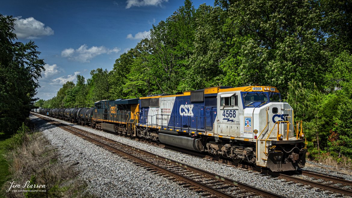 CSXT 4568, 50th Anniversary Operation Lifesaver locomotive, pulls south from the siding at the south end of Slaughters, Ky on April 30th, 2025, on the CSX Henderson Subdivision.

According to a CSX press release: CSX unveiled a new Operation Lifesaver rail safety commemorative locomotive in September of 2022, and it was painted at the railroads locomotive shop in Huntington, West Virginia. The CSXT 4568 engine will travel the company’s rail network as a visual reminder for the public to be safe at highway-rail grade crossings and near railroad tracks.

Tech Info: DJI Mavic 3 Classic Drone, RAW, 22mm, f/2.8, 1/2000, ISO 100.

#railroad #railroads #train #trains #bestphoto #railroadengines #picturesoftrains #picturesofrailway #bestphotograph #photographyoftrains #trainphotography #JimPearsonPhotography #trendingphoto #csxt #trainsfromadrone #csxoperationlifesaver
