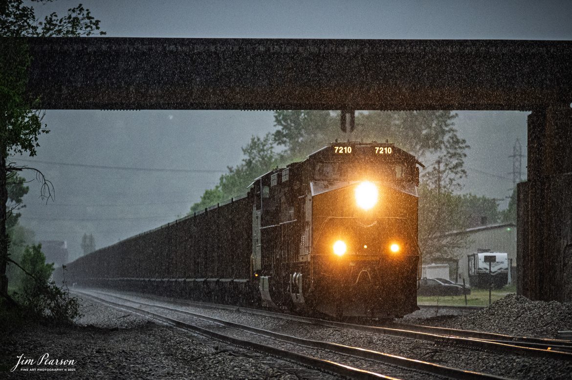 A CSXT 7210 leads an empty coal train passes under the Norfolk Southern Kenova District at Kenova, WV as it heads eastbound a heavy evening rain on the CSX Kanawha Subdivision on May 2nd, 2025.

Tech Info: Nikon Z6ii, RAW, Nikon 24-70 @ 24mm, f/6.3, 1/1250, ISO 14,400.

#railroad #railroads #train, #trains #railway #railway #railtransport #railroadengines #picturesoftrains #picturesofrailways #besttrainphotograph #bestphoto #photographyoftrains #bestsoldpicture #JimPearsonPhotography #onecsx