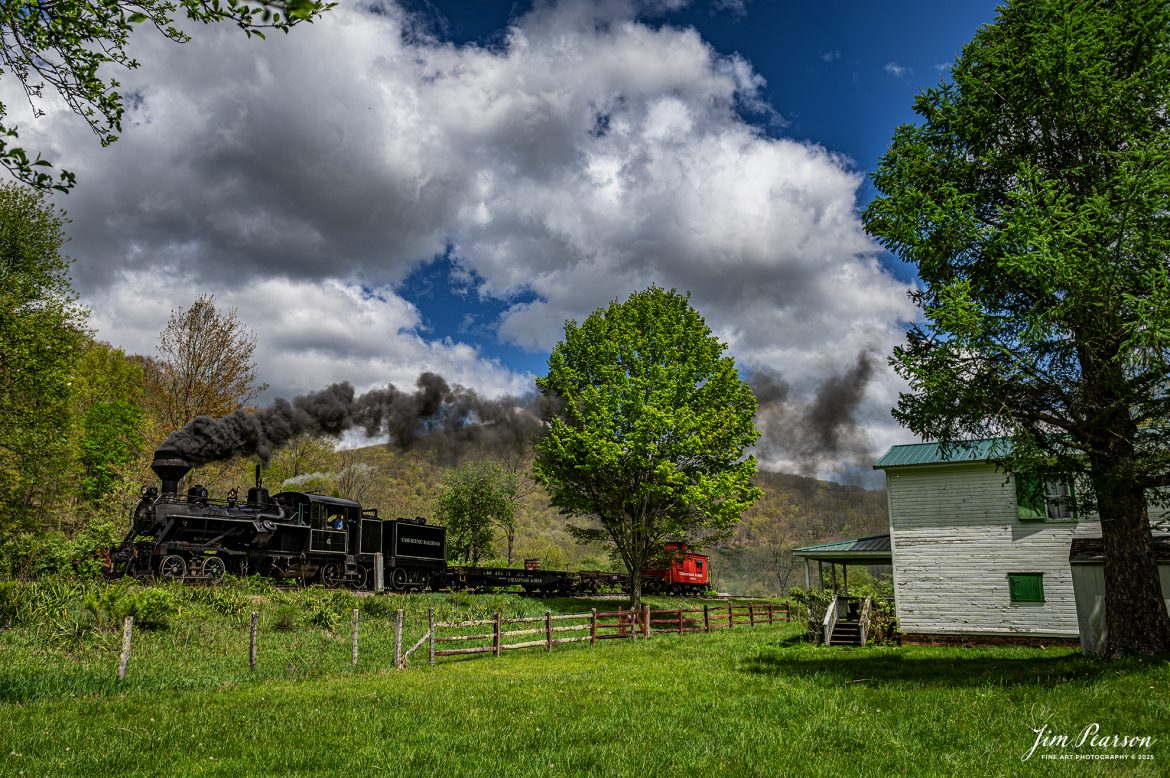 Fireman Brown Culp keeps a watchful eye on the track ahead from Cass Scenic Railway Heisler #6 as they pull past the old farmhouse at Hosterman, WV on the way to back to Cass, West Virginia, during the Cass Spring Photographers Special, on May 4th, 2025. 

According to the Mountain Rail West Virginia Website: The Meadow River Lumber No. 6 was built by the Heisler Locomotive Works in Erie, PA, in 1929 for the Bostonia Coal & Clay Products Company of New Bethlehem, PA.

The Heisler was sold to the Meadow River Lumber Company at Rainelle, WV in 1939, where it was rostered as No. 6. She retired from the lumber company in 1965 and was purchased by the purchased it by the state of West Virginia purchased. The engine ran under its own steam from Rainelle to its new home in Cass in December 1966. No. 6 would begin operating on the railroad in 1968. The Heisler is the fastest geared locomotive in the Cass collection.

Tech Info: Nikon Z6ii, RAW, Nikon 24-70 @ 24mm, f/4, 1/1250, ISO 100.

#railroad #railroads #train, #trains #railway #railway #railtransport #railroadengines #picturesoftrains #picturesofrailways #besttrainphotograph #bestphoto #photographyoftrains #bestsoldpicture #JimPearsonPhotography #steamtrain #casssenicrailway