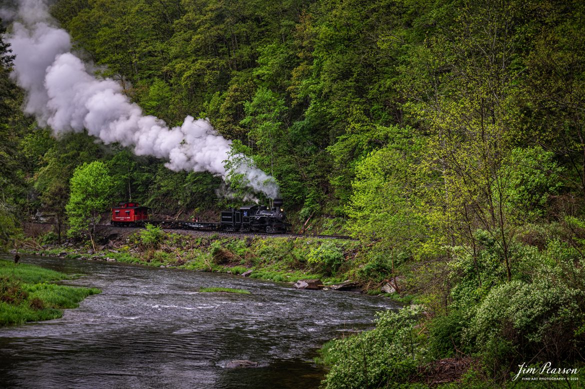 Engineer Noah Barkley keeps a watchful eye on the track ahead from Cass Scenic Railway Heisler #6 as they pull through the countryside at Wanless along the Greenbrier River, on the way to Durban, West Virginia, during the Cass Spring Photographers Special, from Cass, West Virginia on May 4th, 2025. 

According to the Mountain Rail West Virginia Website: The Meadow River Lumber No. 6 was built by the Heisler Locomotive Works in Erie, PA, in 1929 for the Bostonia Coal & Clay Products Company of New Bethlehem, PA.

The Heisler was sold to the Meadow River Lumber Company at Rainelle, WV in 1939, where it was rostered as No. 6. She retired from the lumber company in 1965 and was purchased by the purchased it by the state of West Virginia purchased. The engine ran under its own steam from Rainelle to its new home in Cass in December 1966. No. 6 would begin operating on the railroad in 1968. The Heisler is the fastest geared locomotive in the Cass collection.

Tech Info: Nikon Z6ii, RAW, Nikon 24-70 @ 70mm, f/4.5, 1/320, ISO 200.

#railroad #railroads #train, #trains #railway #railway #railtransport #railroadengines #picturesoftrains #picturesofrailways #besttrainphotograph #bestphoto #photographyoftrains #bestsoldpicture #JimPearsonPhotography #steamtrain #casssenicrailway