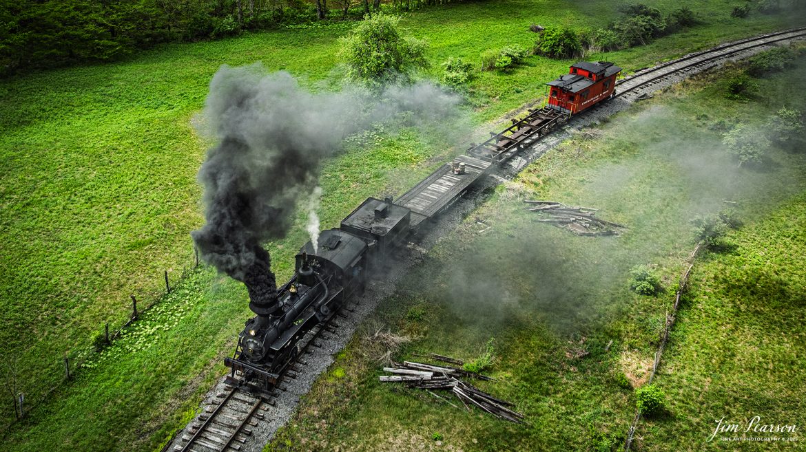 Cass Scenic Railroad Heisler #6 pulls through the countryside just past milepost 92 on the way to Durban, West Virginia, during the Cass Spring Photographers Special, out of Cass, West Virginia on May 4th, 2025. 

According to the Mountain Rail West Virginia Website: The Meadow River Lumber No. 6 was built by the Heisler Locomotive Works in Erie, PA, in 1929 for the Bostonia Coal & Clay Products Company of New Bethlehem, PA.

The Heisler was sold to the Meadow River Lumber Company at Rainelle, WV in 1939, where it was rostered as No. 6. She retired from the lumber company in 1965 and was purchased by the purchased it by the state of West Virginia purchased. The engine ran under its own steam from Rainelle to its new home in Cass in December 1966. No. 6 would begin operating on the railroad in 1968. The Heisler is the fastest geared locomotive in the Cass collection.

Tech Info: DJI Mavic 3 Classic Drone, RAW, 24mm, f/2.8, 1/640, ISO 100.

#railroad #railroads #train, #trains #railway #railway #steamtrains #railtransport #railroadengines #picturesoftrains #picturesofrailways #besttrainphotograph #bestphoto #photographyoftrains #bestsoldpicture #JimPearsonPhotography #trainsfromtheair #trainsfromadrone #steamtrain #casssenicrailroad