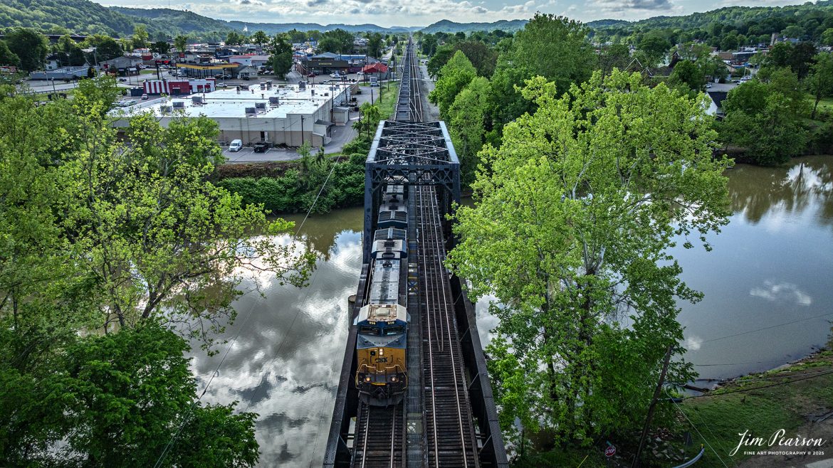 CSXT 956 leads an empty coal train westbound across the Coal River at St. Albans, West Virginia on the CSX Kanawah Subdivision on May 5th, 2025.

Tech Info: DJI Mavic 3 Classic Drone, RAW, 24mm, f/6.3, 1/4000, ISO 420.

#railroad #railroads #train, #trains #railway #railway #steamtrains #railtransport #railroadengines #picturesoftrains #picturesofrailways #besttrainphotograph #bestphoto #photographyoftrains #bestsoldpicture #JimPearsonPhotography #trainsfromtheair #trainsfromadrone