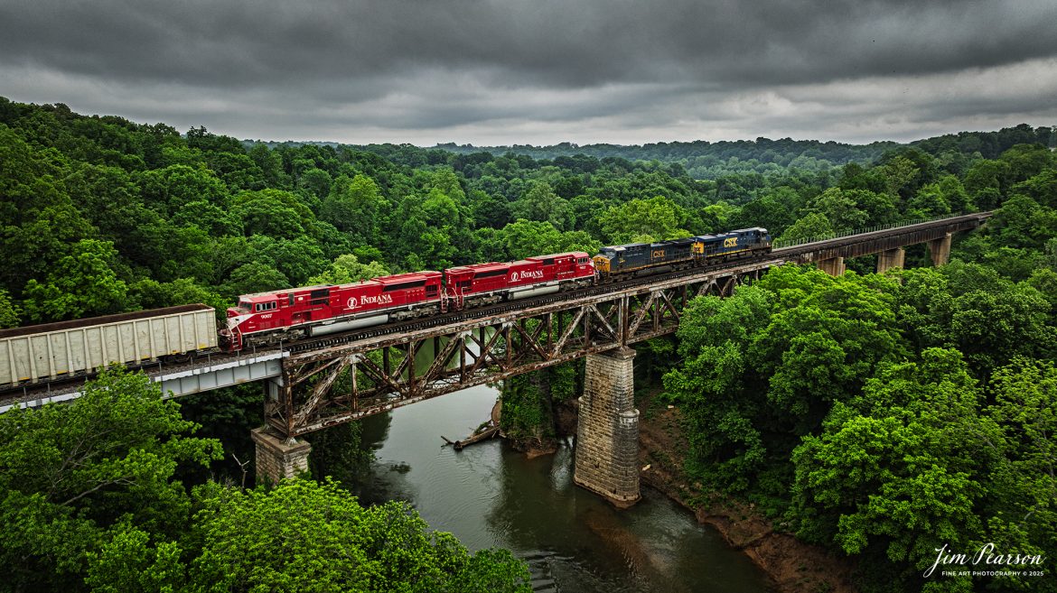 CSXT 5473 leads CSX M513 as it heads south over the Red River at Adams, Tennessee on May 9th, 2025, on the CSX Henderson Subdivision.

This train had Indiana Railroad 9012 and 9007 dead in tow as the trailing units. I’m told both engines were on their way to Memphis, Tennessee where they will be scrapped. Both units are SD90MACs.

Tech Info: DJI Mavic 3 Classic Drone, RAW, 22mm, f/2.8, 1/640, ISO 170.

#trainphotography #railroadphotography #trains #railways #trainphotographer #railroadphotographer #jimpearsonphotography #Indianarailroad #inrd