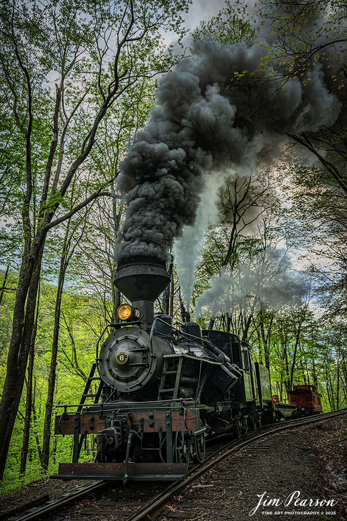 Cass Scenic Railway Heisler #6 passes the first switchback on the way to Whittaker during the Cass Spring Photographers Special, out of Cass, West Virginia on May 3rd, 2025. 

According to the Mountain Rail West Virginia Website: The Meadow River Lumber No. 6 was built by the Heisler Locomotive Works in Erie, PA, in 1929 for the Bostonia Coal & Clay Products Company of New Bethlehem, PA.

The Heisler was sold to the Meadow River Lumber Company at Rainelle, WV in 1939, where it was rostered as No. 6. She retired from the lumber company in 1965 and purchased by the State of West Virginia. The engine ran under its own steam from Rainelle to its new home in Cass in December 1966. No. 6 would begin operating on the railroad in 1968. The Heisler is the fastest geared locomotive in the Cass collection.

Tech Info: Nikon Z6ii, RAW, Nikon 24-70 @ 24mm, f/4, 1/640, ISO 250.

#railroad #railroads #train, #trains #railway #railway #steamtrains #railtransport #railroadengines #picturesoftrains #picturesofrailways #besttrainphotograph #bestphoto #photographyoftrains #bestsoldpicture #JimPearsonPhotography #steamtrains #cassscenicrailway