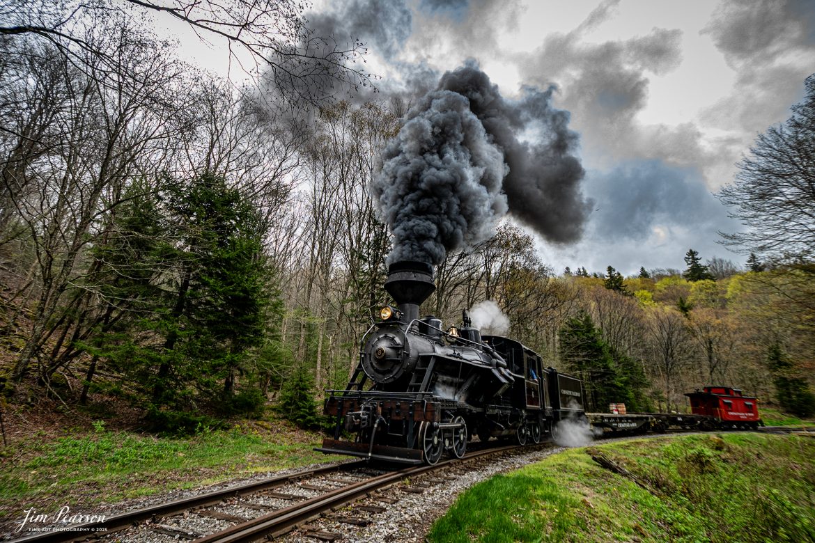 Cass Scenic Railroad Heisler #6 pulls up hill from the emergency water tank as they head for Bald Knob, WV during the Cass Spring Photographers Special, from Cass, West Virginia on May 3rd, 2025. 

According to the Mountain Rail West Virginia Website: The Meadow River Lumber No. 6 was built by the Heisler Locomotive Works in Erie, PA, in 1929 for the Bostonia Coal & Clay Products Company of New Bethlehem, PA.

The Heisler was sold to the Meadow River Lumber Company at Rainelle, WV in 1939, where it was rostered as No. 6. She retired from the lumber company in 1965 and was purchased by the purchased it by the state of West Virginia purchased. The engine ran under its own steam from Rainelle to its new home in Cass in December 1966. No. 6 would begin operating on the railroad in 1968. The Heisler is the fastest geared locomotive in the Cass collection.

Tech Info: Nikon Z6ii, RAW, Nikon 10-24@ 10mm, f/4.5, 1/640, ISO 280.

#railroad #railroads #train, #trains #railway #railway #railtransport #railroadengines #picturesoftrains #picturesofrailways #besttrainphotograph #bestphoto #photographyoftrains #bestsoldpicture #JimPearsonPhotography #steamtrain #casssenicrailroad