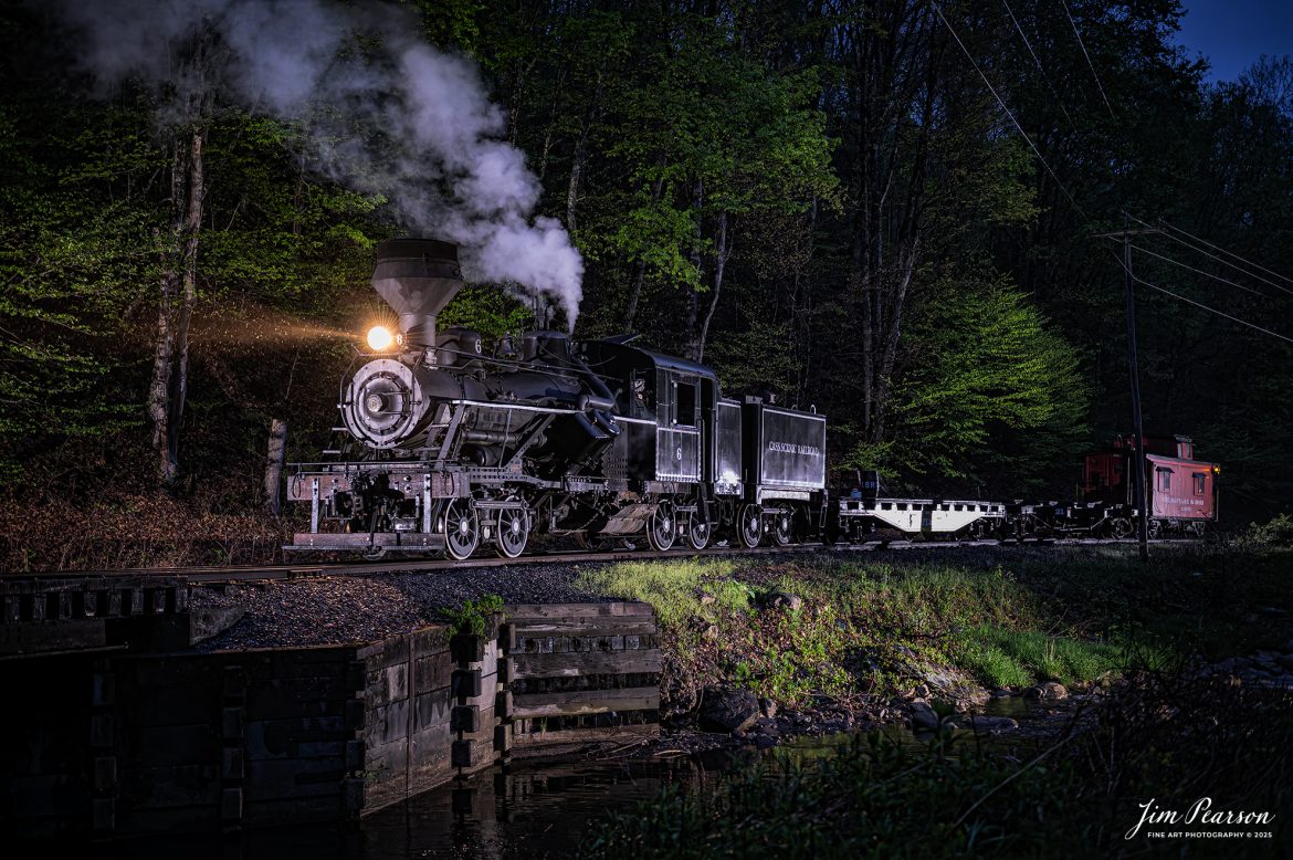 Cass Scenic Railroad Heisler #6 pulls across the bridge in a light rain at Leatherbark Creek during a night photo shoot as part of the Cass Spring Photographers Special, at Cass, West Virginia on May 3rd, 2025. 

According to the Mountain Rail West Virginia Website: The Meadow River Lumber No. 6 was built by the Heisler Locomotive Works in Erie, PA, in 1929 for the Bostonia Coal & Clay Products Company of New Bethlehem, PA.

The Heisler was sold to the Meadow River Lumber Company at Rainelle, WV in 1939, where it was rostered as No. 6. She retired from the lumber company in 1965 and was purchased by the purchased it by the state of West Virginia purchased. The engine ran under its own steam from Rainelle to its new home in Cass in December 1966. No. 6 would begin operating on the railroad in 1968. The Heisler is the fastest geared locomotive in the Cass collection.

Tech Info: Nikon Z6ii, RAW, Nikon 24-70 @ 44mm, f/2.8, 1/125, ISO 16,000.

#railroad #railroads #train, #trains #railway #railway #railtransport #railroadengines #picturesoftrains #picturesofrailways #besttrainphotograph #bestphoto #photographyoftrains #bestsoldpicture #JimPearsonPhotography #steamtrain #casssenicrailroad
