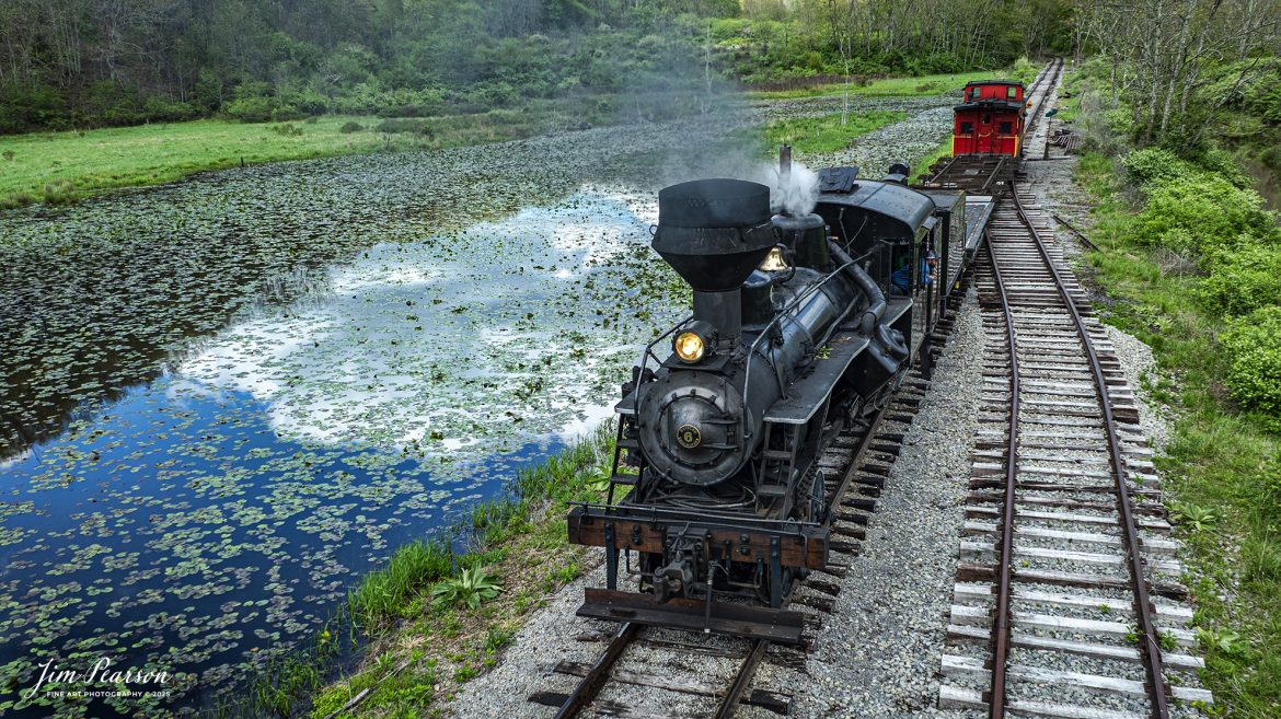 Cass Scenic Railroad Heisler #6 passes the siding at Hosterman, West Virginia, during the Cass Spring Photographers Special, as it heads back to Cass, West Virginia on May 4th, 2025. 

According to the Mountain Rail West Virginia Website: The Meadow River Lumber No. 6 was built by the Heisler Locomotive Works in Erie, PA, in 1929 for the Bostonia Coal & Clay Products Company of New Bethlehem, PA.

The Heisler was sold to the Meadow River Lumber Company at Rainelle, WV in 1939, where it was rostered as No. 6. She retired from the lumber company in 1965 and was purchased by the purchased it by the state of West Virginia purchased. The engine ran under its own steam from Rainelle to its new home in Cass in December 1966. No. 6 would begin operating on the railroad in 1968. The Heisler is the fastest geared locomotive in the Cass collection.

Tech Info: DJI Mavic 3 Classic Drone, RAW, 24mm, f/6.3, 1/640, ISO 100.

#railroad #railroads #train, #trains #railway #railway #steamtrains #railtransport #railroadengines #picturesoftrains #picturesofrailways #besttrainphotograph #bestphoto #photographyoftrains #bestsoldpicture #JimPearsonPhotography #trainsfromtheair #trainsfromadrone #steamtrain #casssenicrailway